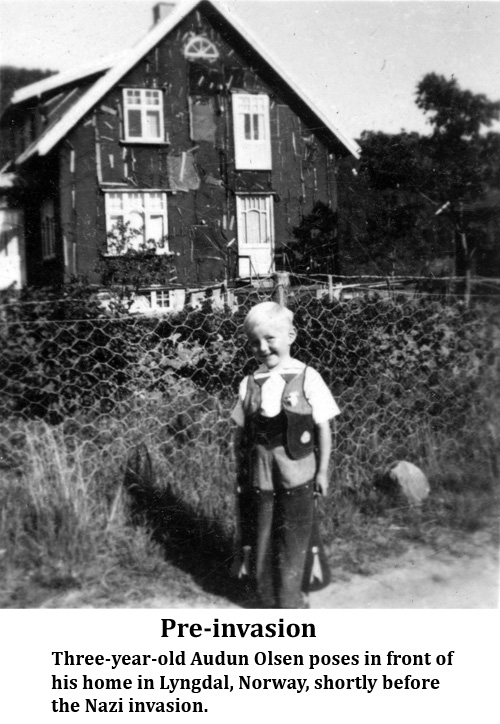 Pre-invasion. Three-year-old Audun Olsen poses in front of his home in Lyngdal, Norway, shortly before the Nazi invasion.